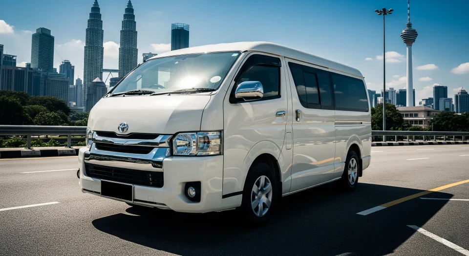 Ilustrasi van Toyota Hiace dengan latar Kuala Lumpur